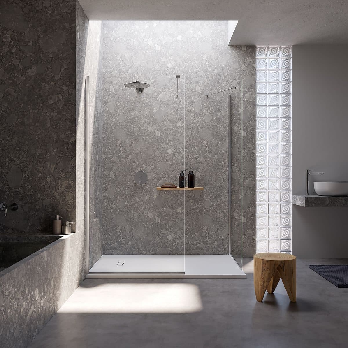 Bathroom with a walk-in shower and stone walls, Atelier Matière bathroom fixtures