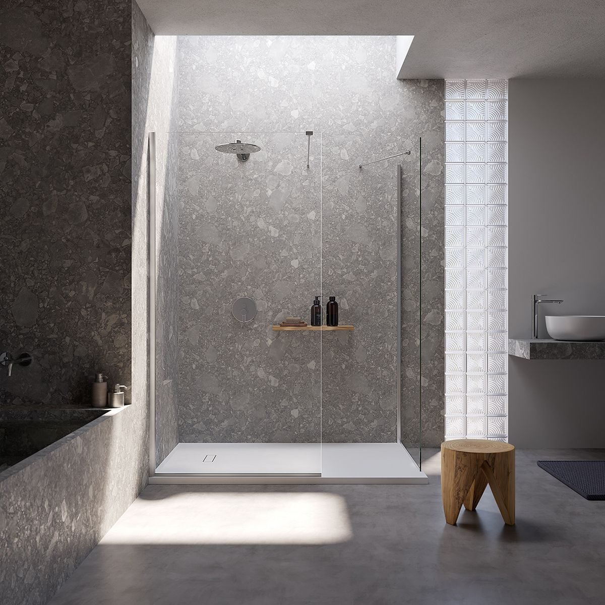 Bathroom with a walk-in shower and stone walls, Atelier Matière bathroom fixtures